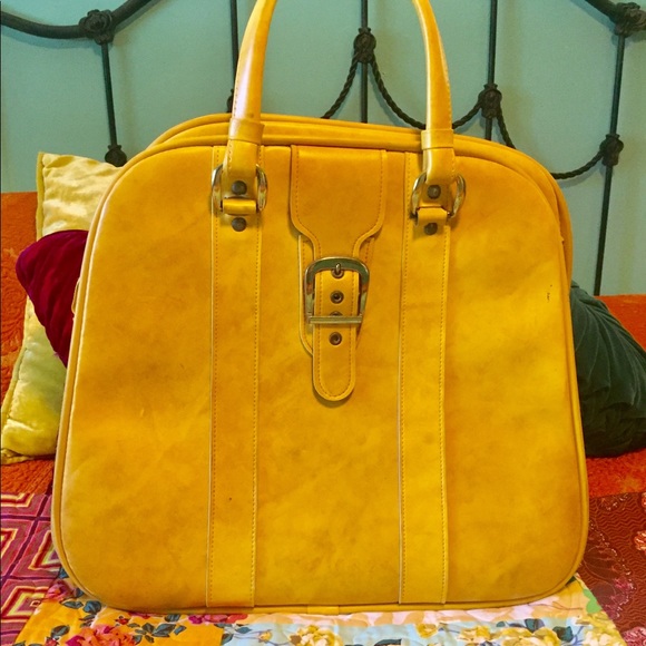 mustard yellow luggage